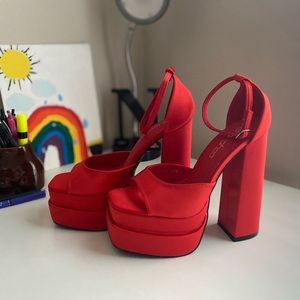 Red platform shoes